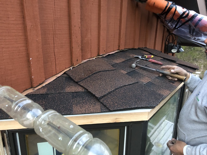 Custom roof built over this Pella bay window - Window Solutions Plus - Master craftsmanship